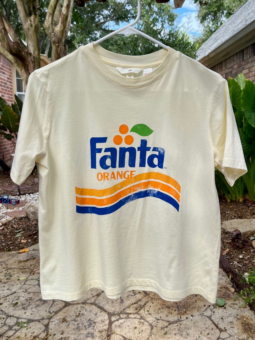 H&M Butter yellow-Cream Fanta Orange Graphic Tee with Blue and Orange Logo